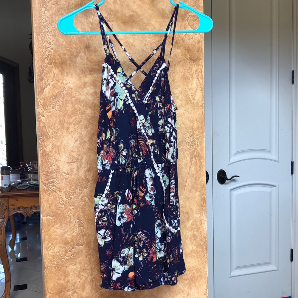 Floral romper with pockets and some classy lace